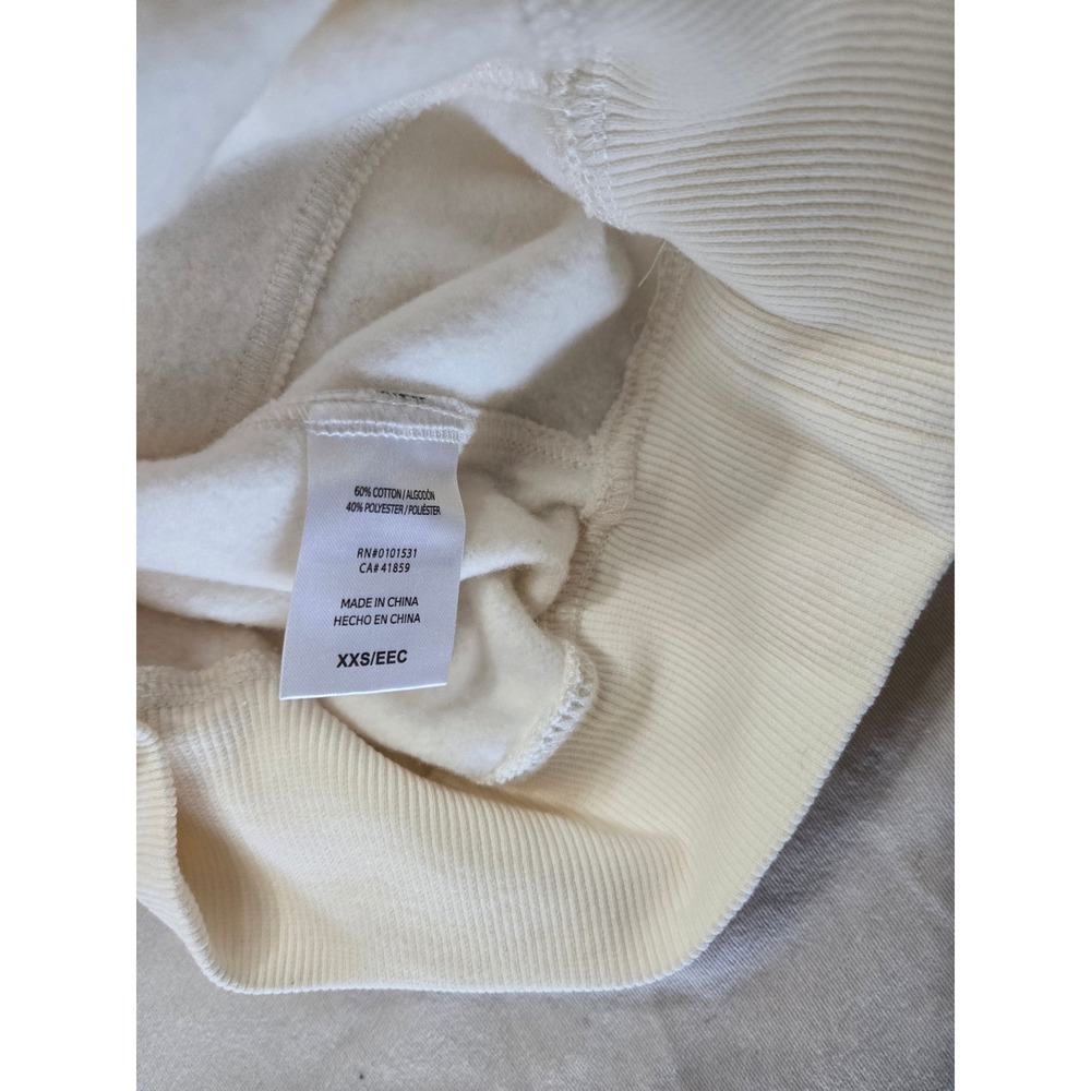 Wicked Movie Butterfly Pearl Graphic Sweatshirt Cream XXS 5UWT01OGLC NWT - Picture 4 of 10
